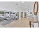 Spacious open-concept living area with modern kitchen, dining, and living space at 1921 Fern Ave, Sarasota, FL 34235