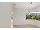 Dining room with tile floors and views of the outdoor living space at 19798 Cobblestone Cir, Venice, FL 34292