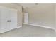 Spacious bedroom with carpeting and closet space, offering comfort and functionality at 2290 Beeville Ave, North Port, FL 34286