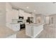 This kitchen features granite counters, tile backsplash, and stainless steel appliances at 2290 Beeville Ave, North Port, FL 34286