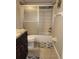 Cozy bathroom featuring an updated vanity sink and tiled shower at 2300 Stickney Point Rd # 125, Sarasota, FL 34231