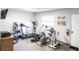Community gym area featuring modern exercise equipment at 2300 Stickney Point Rd # 125, Sarasota, FL 34231