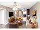 Open living area seamlessly connecting to the kitchen, featuring modern furnishings and ample space for relaxation and entertaining at 2300 Stickney Point Rd # 125, Sarasota, FL 34231