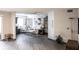 Open living space featuring modern flooring and bright interior design at 2300 Stickney Point Rd # 125, Sarasota, FL 34231
