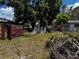 Exterior view of the home's backyard and storage building at 2503 23Rd W Ave, Bradenton, FL 34205