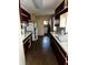 Functional kitchen featuring ample cabinets and a double door refrigerator at 2503 23Rd W Ave, Bradenton, FL 34205