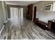 Inviting living room featuring modern gray flooring and neutral wall paint at 2503 23Rd W Ave, Bradenton, FL 34205