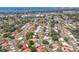 Aerial view of homes in a neighborhood with tree-lined streets at 2536 Carlisle Pl, Sarasota, FL 34231