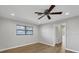 Bedroom boasting tile floors, a ceiling fan and natural light at 2536 Carlisle Pl, Sarasota, FL 34231