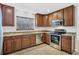 Traditional kitchen with stainless steel appliances and granite countertops at 2536 Carlisle Pl, Sarasota, FL 34231