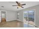 Living area featuring tile floors and a sliding glass door to a patio at 2536 Carlisle Pl, Sarasota, FL 34231