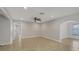 Spacious living room featuring neutral paint, recessed lighting, and tile floors at 2536 Carlisle Pl, Sarasota, FL 34231
