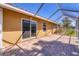 Screened-in patio with brick flooring offering a seamless transition to the outdoors at 2536 Carlisle Pl, Sarasota, FL 34231