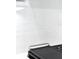 The white tile backsplash has slight variations in it giving it a handcrafted, unique look at 256 Van Gogh Cv, Bradenton, FL 34212