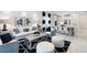 Open living and dining space featuring white walls, modern lighting, and stylish décor at 256 Van Gogh Cv, Bradenton, FL 34212