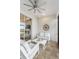 Cozy screened in patio with outdoor seating at 256 Van Gogh Cv, Bradenton, FL 34212