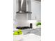 Close up of a gas stovetop featuring a sleek stainless steel range hood and white subway tile backsplash at 256 Van Gogh Cv, Bradenton, FL 34212