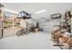 Spacious garage with epoxy flooring and built-in shelving at 27061 Paradise Shores Dr, Englewood, FL 34223