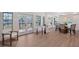 Open concept living area featuring wood-look floors, neutral paint, and views of the waterfront at 2833 Bay Shore Cir, Sarasota, FL 34234