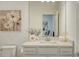 Bathroom with modern vanity, white marble countertop, and flower decoration at 2907 61St E Ter, Ellenton, FL 34222
