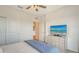 Bright bedroom featuring a ceiling fan, TV, and neutral color palette at 2907 61St E Ter, Ellenton, FL 34222