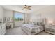 Cozy bedroom with large windows and a writing desk with vanity, creating a peaceful retreat at 2907 61St E Ter, Ellenton, FL 34222