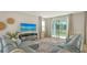 Inviting living room with neutral tones, sliding glass doors, and comfortable seating at 2907 61St E Ter, Ellenton, FL 34222
