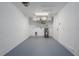 Clean and organized garage with painted walls and floor at 3712 19Th E St, Bradenton, FL 34208