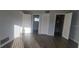 Bedroom featuring natural light with a view and luxury vinyl flooring at 3751 S School Ave # 19, Sarasota, FL 34239