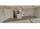 Spacious open concept living room with stainless steel appliances and an island at 3751 S School Ave # 19, Sarasota, FL 34239