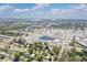 Wide aerial shot showcases the community and home's proximity to local amenities and surrounding areas at 409 Olive Ave, Nokomis, FL 34275