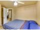 Spacious bedroom with a double bed and view into the hallway at 409 Olive Ave, Nokomis, FL 34275