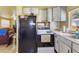 Kitchen with a full-sized refrigerator and oven at 409 Olive Ave, Nokomis, FL 34275