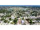 Aerial view of a home in a neighborhood with tree coverage at 4616 22Nd W Ave, Bradenton, FL 34209