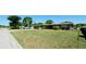 Charming single-story home with a well-maintained lawn, mature trees, and a welcoming facade in a suburban setting at 4616 22Nd W Ave, Bradenton, FL 34209