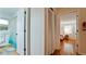 Hallway leads to bathroom and bedroom with closet for extra storage at 4616 22Nd W Ave, Bradenton, FL 34209