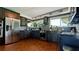 Stylish kitchen with modern appliances, granite countertops, and dark wood cabinets, creating a sleek design at 4616 22Nd W Ave, Bradenton, FL 34209