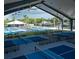 Overhead view of covered outdoor pickleball courts with picnic tables at 4616 22Nd W Ave, Bradenton, FL 34209
