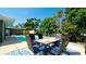 Back yard area includes in-ground pool and outdoor dining space at 4616 22Nd W Ave, Bradenton, FL 34209