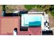 Aerial view of a pool with table and chairs, next to the house at 4616 22Nd W Ave, Bradenton, FL 34209