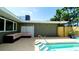 Back yard features patio, pool, and comfortable seating at 4616 22Nd W Ave, Bradenton, FL 34209