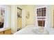 Charming bedroom featuring shiplap accent wall, double windows, and comfortable bed at 4721 Garcia Ave, Sarasota, FL 34233