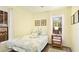 Charming bedroom featuring a comfy queen bed, nautical decor, and natural light at 4721 Garcia Ave, Sarasota, FL 34233