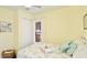 Bright bedroom with a double closet and a beachy, inviting atmosphere at 4721 Garcia Ave, Sarasota, FL 34233