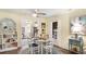 Charming dining area with a round table and seating for four, with views to the kitchen at 4721 Garcia Ave, Sarasota, FL 34233