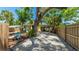 Charming yellow house with a long driveway and covered parking area at 4721 Garcia Ave, Sarasota, FL 34233