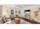 Comfortable living room offering a relaxing space with beachy decor and plenty of natural light at 4721 Garcia Ave, Sarasota, FL 34233