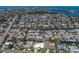 Wide aerial view showcasing the property's location within a residential neighborhood near the waterfront at 508 70Th St, Holmes Beach, FL 34217
