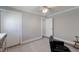Bright bedroom features gray walls, ceiling fan and closet at 508 70Th St, Holmes Beach, FL 34217