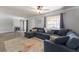 Inviting living room with cozy seating area, stylish rug, and ample natural light at 508 70Th St, Holmes Beach, FL 34217